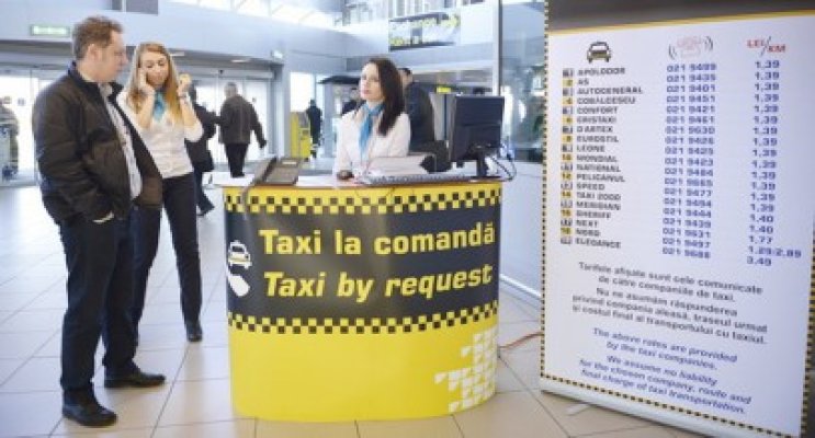Taxi-urile de la aeroport vor fi comandate pe calculator